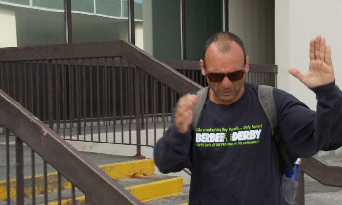 Fabio Guerrieri, who was arrested for allegedly sabotaging The Epoch Times newspaper boxes, outside the Ontario Court of Justice in North York, Ont., on Aug. 26, 2019. (NTD Television)