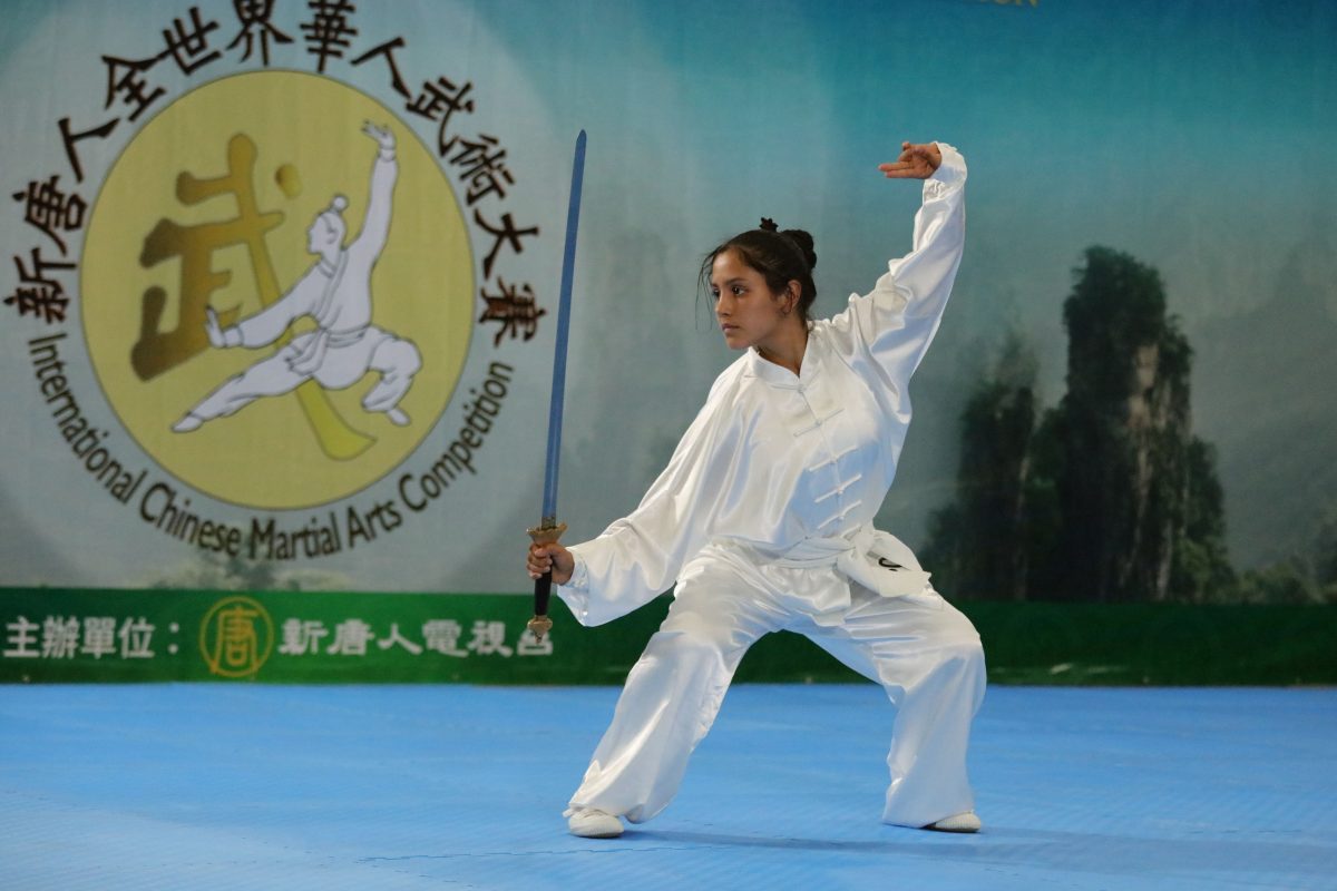 Laura Franco Gomez won the Silver Award in the Women's Armed Division of the 6th New Tang Dynasty Wushu Competition. (Zhang Xuehui/The Epoch Times)