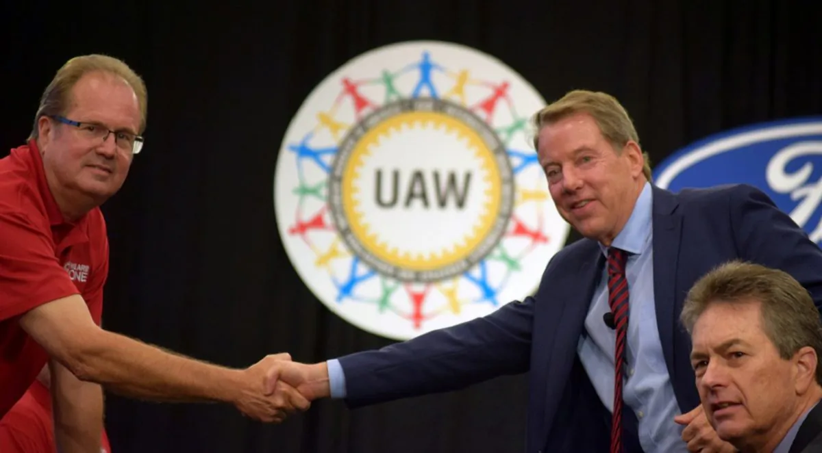 UAW President Gary Jones (L) shakes hands with Ford Motor Co Chairman Bill Ford at the start of contract talks between the union and the automaker in Detroit, Michigan, U.S., on July 15, 2019. (Nick Carey/File Photo/Reuters)