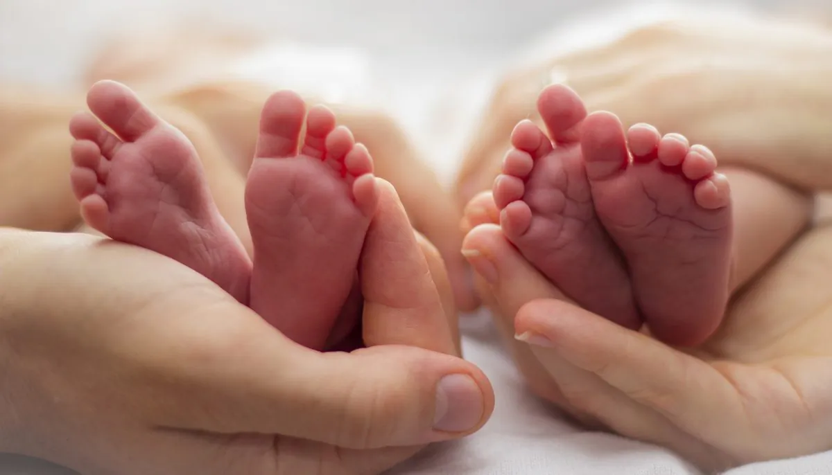 A stock image of twins. (Illustration - Shutterstock)