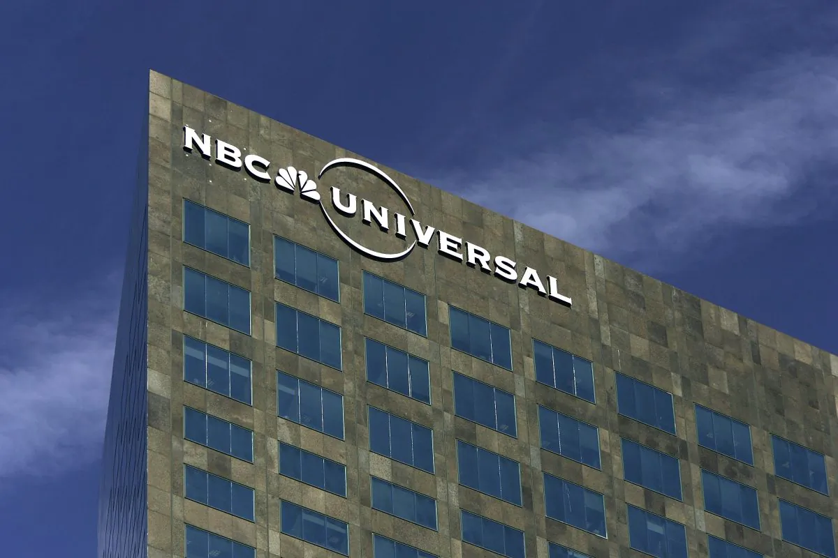 The NBC Universal logo is seen on its headquarters building in Los Angeles, Calif., in a file photograph. (David McNew/Getty Images)