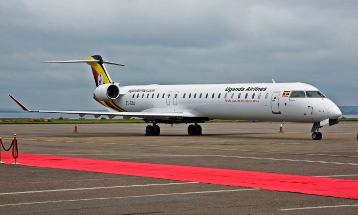 A Uganda Airlines Bombadier aircraft prepares for departure at Entebbe airport during the launch of Uganda Airlines maiden flight to Jomo Kenyatta International Airport in Nairobi on Aug. 27, 2019. (Isacc Kasamani/AFP/Getty Images)