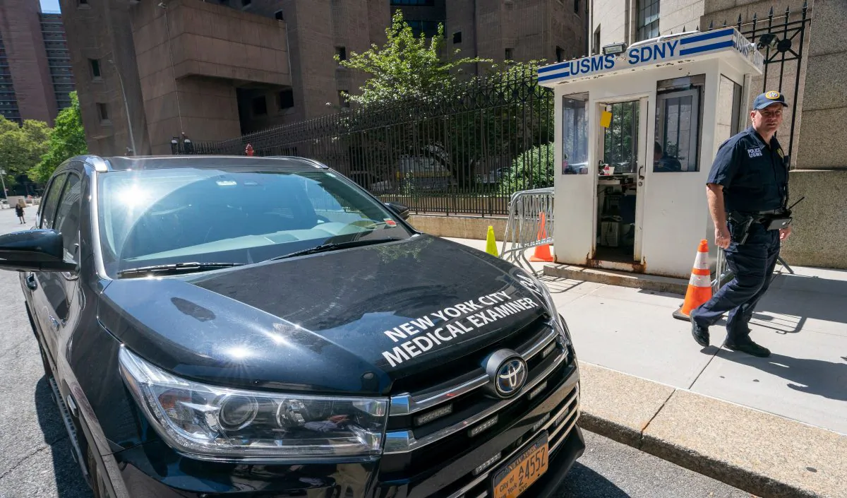 A New York Medical Examiner's car is parked outside the Metropolitan Correctional Center where financier Jeffrey Epstein was being held, on Aug. 10, 2019, in New York. (DON EMMERT/AFP/Getty Images)