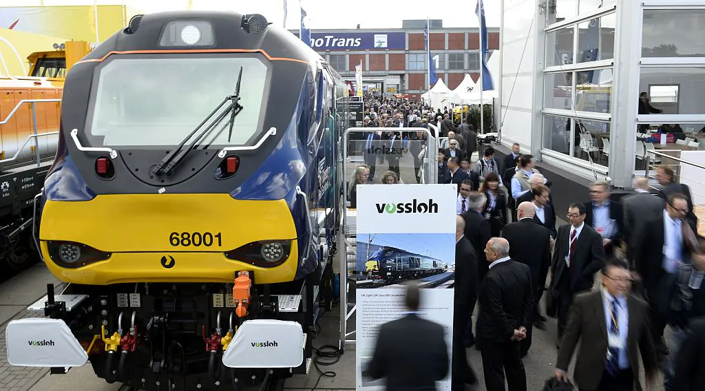 Fairgoers take a look on a displayed Eurolight train by Vossloh during the opening day of the Innotrans International Trade Fair for Transport and Mobility in Berlin on Sept. 23, 2014. (Tobias Schwarz/AFP/Getty Images)