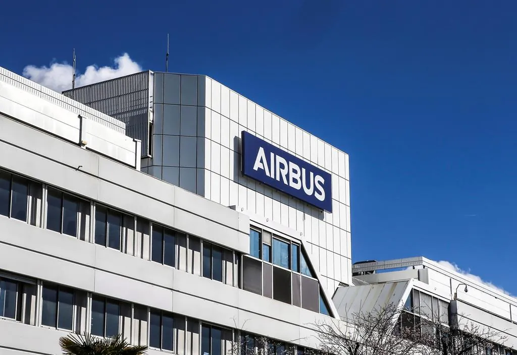 This March 6, 2018, photo shows a logo of Airbus group is displayed in front of its headquarters in Toulouse, western France. European aerospace giant Airbus is pulling out of the high-stakes competition to build Canada's next fighter jet following complaints about the competition. (Fred Scheiber/AP/The Canadian Press)