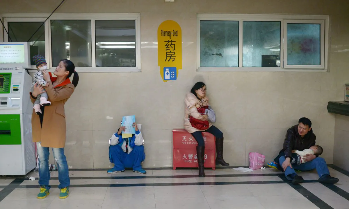 Parents and children at a hospital in China. (Wang Zhao/AFP/Getty Images)