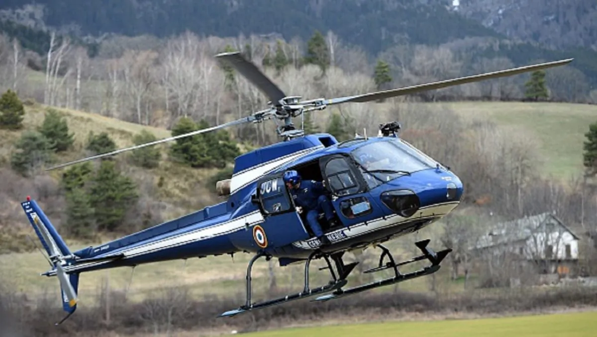 An Aerospatiale AS350 Ecureuil helicopter of the French National Gendarmerie is seen in Seyne, south-eastern France, near the site where a Germanwings Airbus A320 crashed in the French Alps., on March 24, 2015. (Anne-Christine Poujoulat /AFP/Getty Images)
