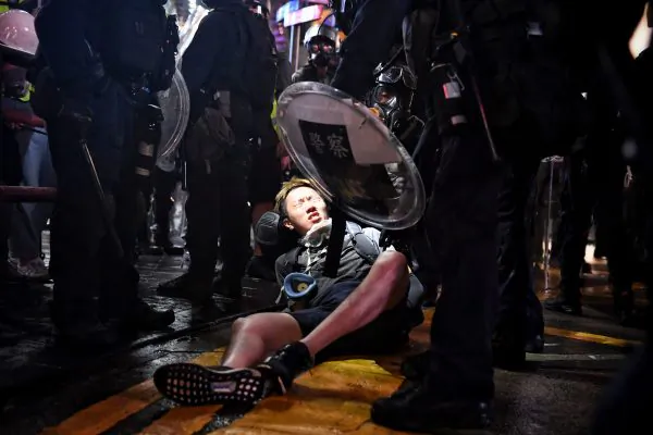 A protester is detained at Causeway Bay in Hong Kong on Aug. 31, 2019. (Lillian Suwanrumpha/AFP/Getty Images)