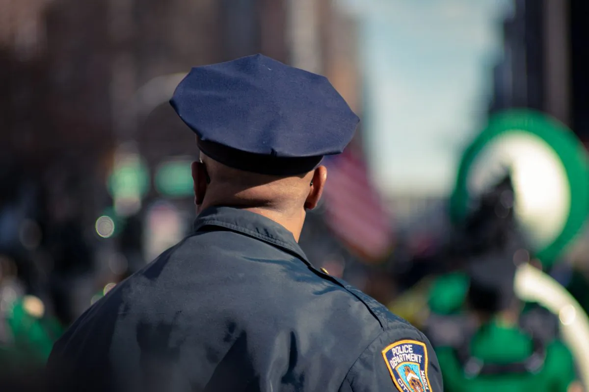 File photo of an unidentified police officer. (Fred Mouniguet / Unsplash)