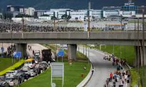 Hong Kong Protesters Disrupt Airport but Planes Still Taking Off