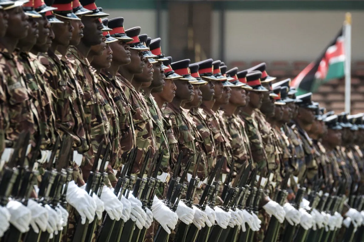 Kenyan army soldiers perform during the rehearsal of the inauguration ceremony of the President at the Moi International Sports Center's Kasarani Stadium in Nairobi on Nov. 27, 2017. (AFP Photo/Yasuyoshi Chiba)
