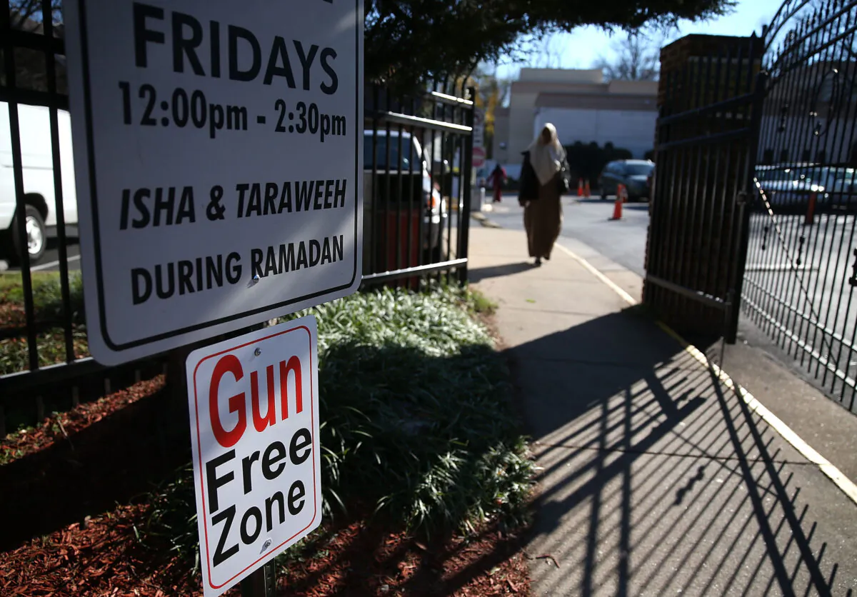 A sign reads Gun Free Zone at the entrance to the Dar Al-Hijrah Mosque, Dec. 4, 2015 in Falls Church, Va. (Mark Wilson/Getty Images)