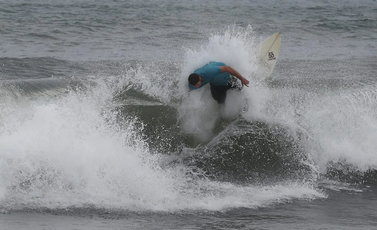 A surfer enjoys the waves as Hurricane Dorian continues to make its way toward the Florida coast in Boca Ration, Florida, on Sept. 2, 2019. (Joe Readle/Getty Images)