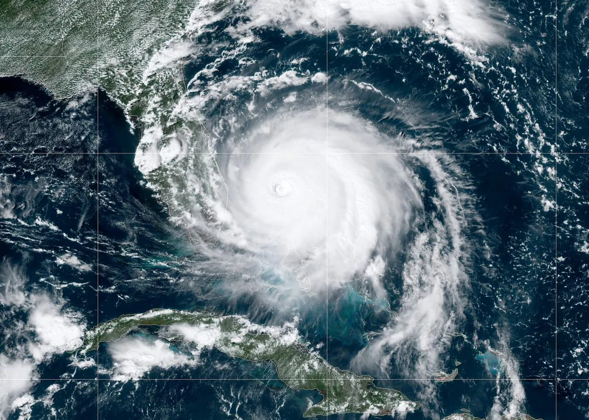 In this NOAA GOES-East satellite handout image, Hurricane Dorian, now a Cat. 4 storm, moves slowly past Grand Bahama Island on Sept. 2, 2019 in the Atlantic Ocean. (NOAA via Getty Images)