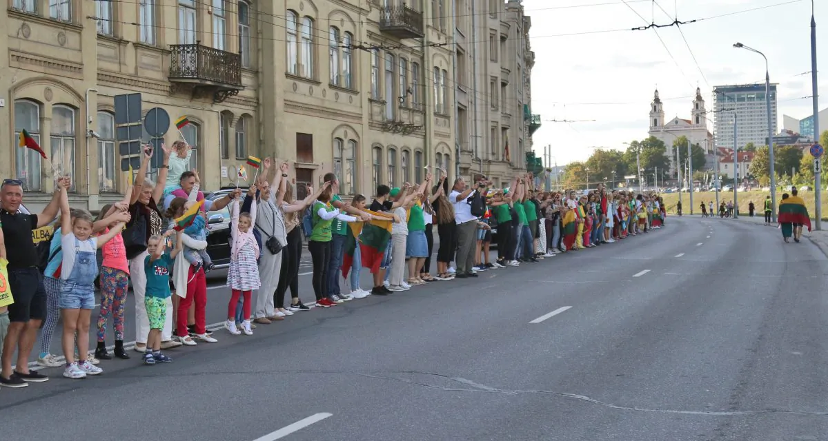 People form a human chain under the motto "The Baltic Way - It's Us" from Gediminas Tower to the City Limits in Vilnius, Lithuania on Aug. 23, 2019. From Catalan separatists to Hong Kong pro-democracy activists, the human chain that helped the Baltic states win independence from the Soviet Union three decades ago still inspires freedom-seekers the world over. (Petras Malukas /AFP/Getty Images)