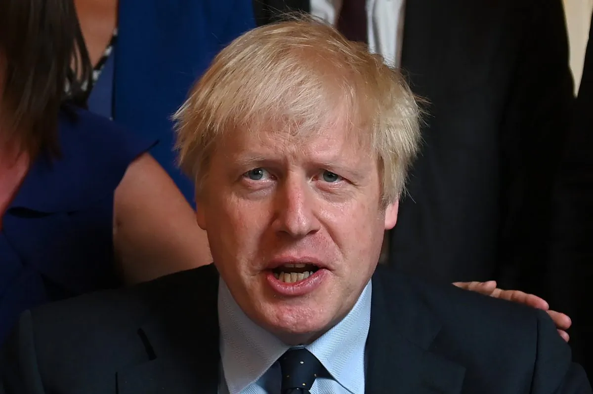 Britain's Prime Minister Boris Johnson reacts as he meets with NHS workers as they take afternoon tea inside 10 Downing Street on Sept. 3, 2019 in London, United Kingdom. (Daniel Leal-Olivas-WPA Pool/Getty Images)