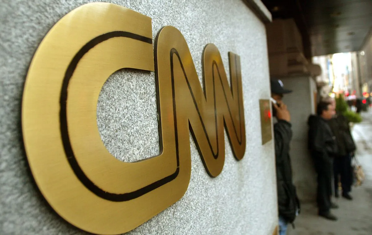 The CNN sign is seen outside its headquarters Nov. 12, 2002 in New York City. (Mario Tama/Getty Images)