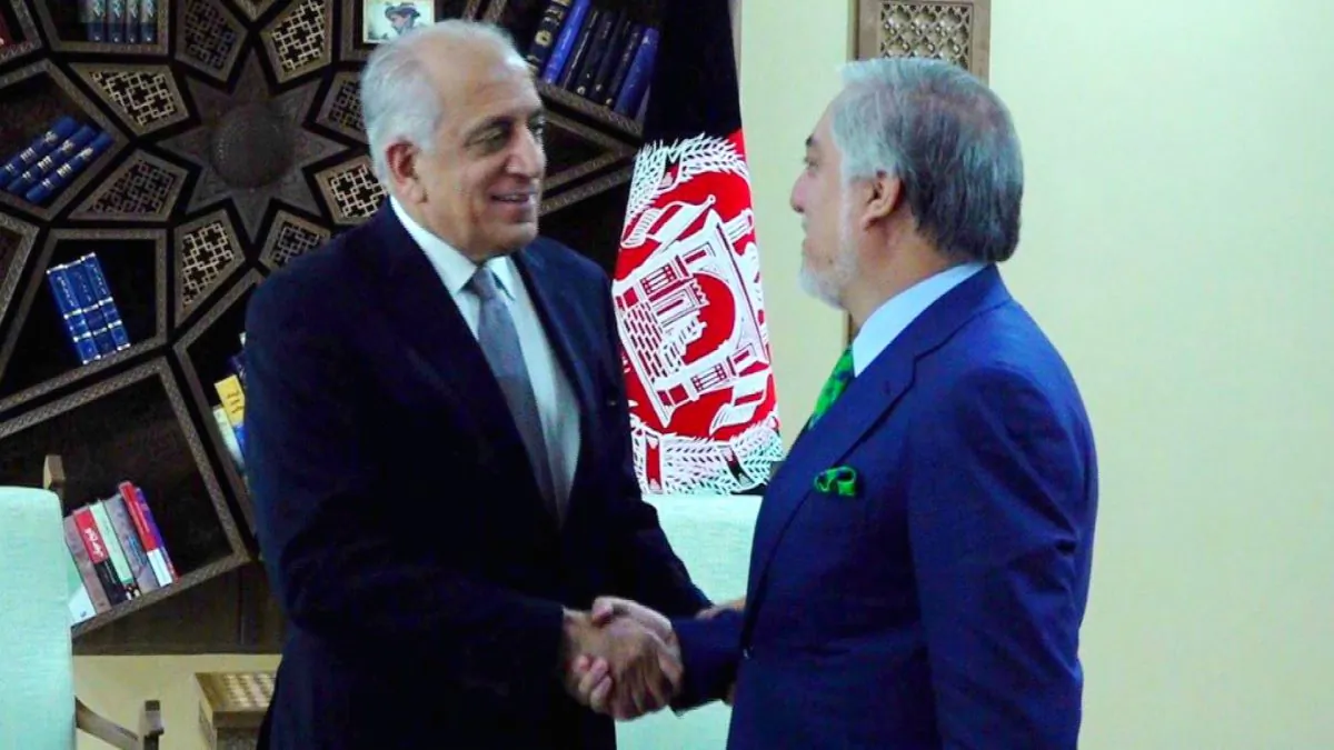 U.S. special representative for Afghanistan, Zalmay Khalilzad (L), shakes hands with Afghanistan's Chief Executive Abdullah Abdullah in Kabul, Afghanistan on Sept. 2, 2019. (Afghan Chief Executive office/Handout via Reuters)