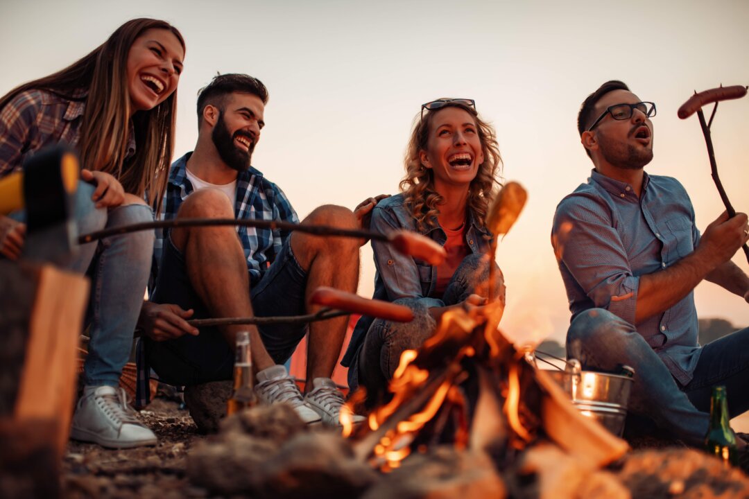 Sharing stories around a fire has a potent power to bond people in a shared experience. (Ivanko80/Shutterstock)