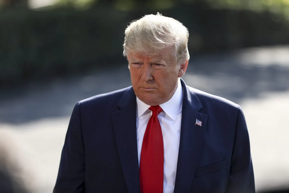 President Donald Trump speaks to media before departing on Marine One en route to Ohio and Texas, from the White House South Lawn in Washington on Aug. 7, 2019. (Charlotte Cuthbertson/The Epoch Times)