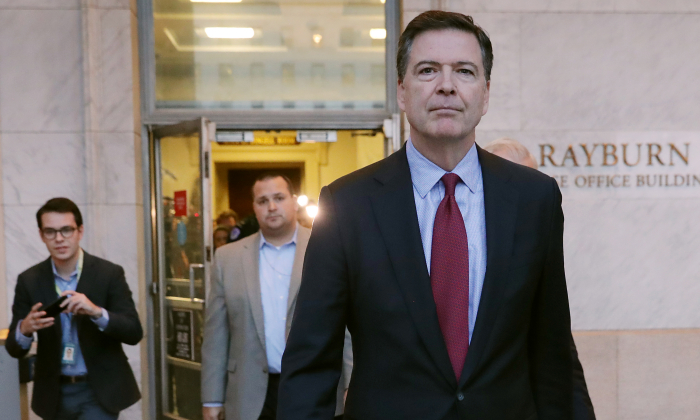 Former Federal Bureau of Investigation Director James Comey leaves the Rayburn House Office Building after testifying to the House Judiciary and Oversight and Government Reform committees on Capitol Hill in Washington on Dec. 7, 2018. (Chip Somodevilla/Getty Images)