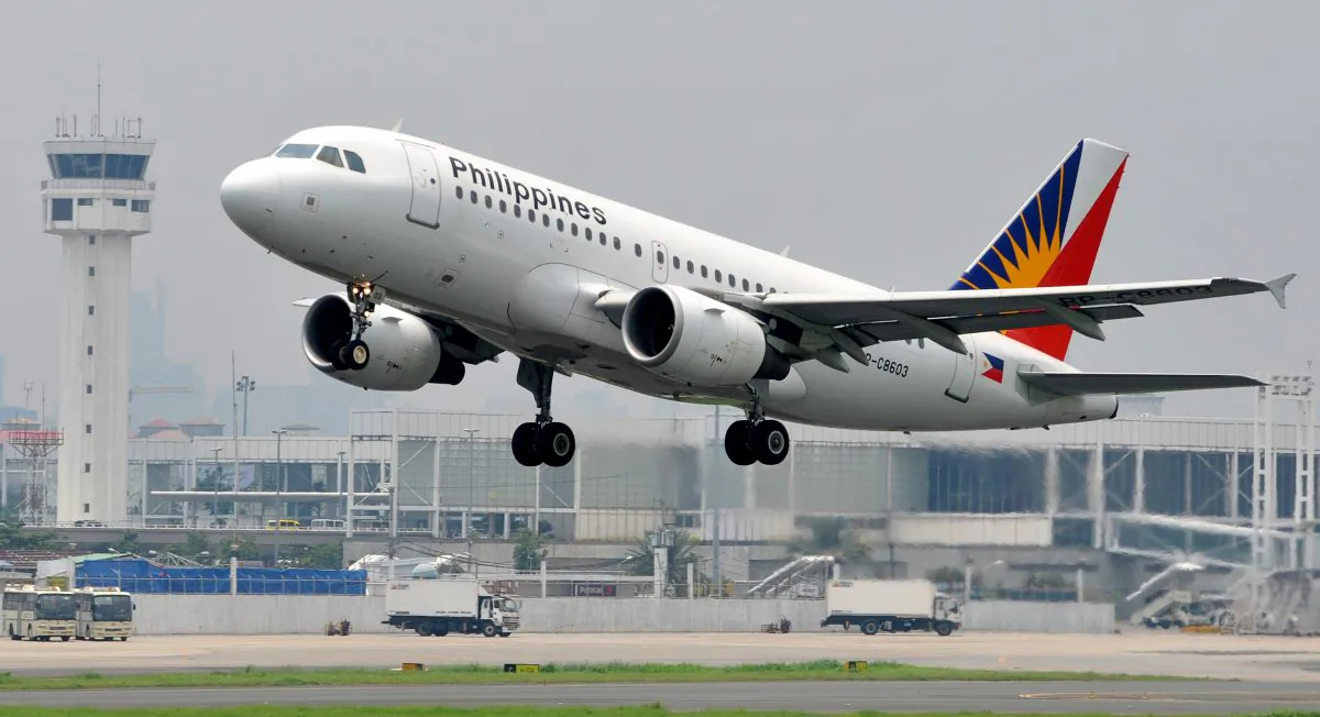 A plane takes off at the Ninoy Aquino International Airport on Aug. 5, 2010. (Noel Celis/AFP/Getty Images)