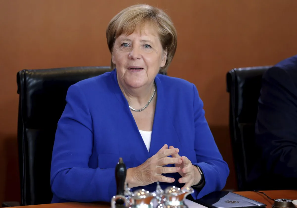 German Chancellor Angela Merkel smiles as she arrives for the weekly cabinet meeting at the Chancellery in Berlin, Germany on Sept. 4, 2019. (Michael Sohn/AP)