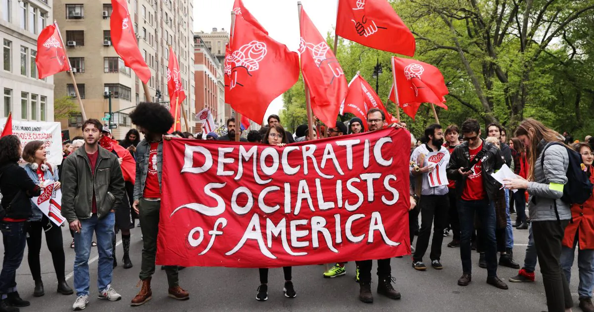 Members of the Democratic Socialists of America gather outside of a Trump owned building on May Day in New York City, on May 1, 2019. (Spencer Platt/Getty Images)