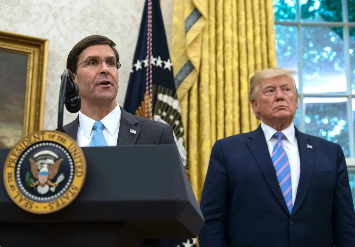 Defense Secretary Mark Esper speaks after he was sworn in as President Donald Trump looks on in the Oval Office at the White House in Washington, DC, on July 23, 2019. (Nicholas Kamm/AFP/Getty Images)