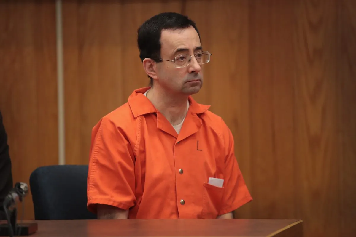 Larry Nassar sits in court listening to statements before being sentenced by Judge Janice Cunningham for three counts of criminal sexual assault in Eaton County Circuit Court in Charlotte, Mich., on Feb. 5, 2018. (Scott Olson/Getty Images)