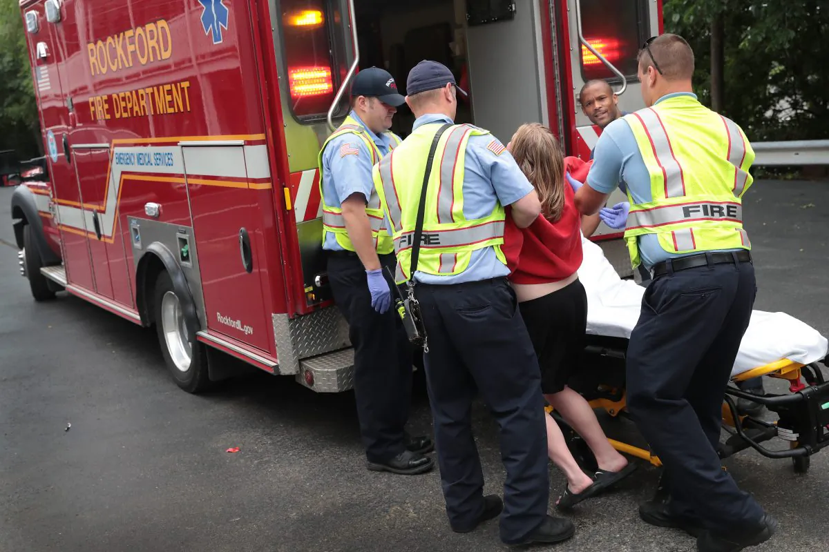 Firefighters help an overdose victim in Rockford, Illinois, on July 14, 2017. (Scott Olson/Getty Images)