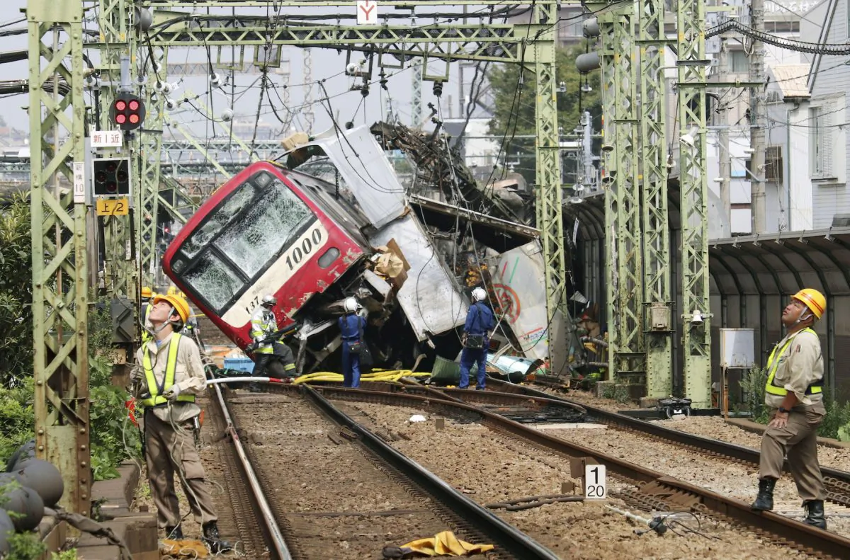 A train is seen as it is derailed after a collision with a truck in Yokohama, near Tokyo, Japan on Sept. 5, 2019. (Kyodo/via Reuters)