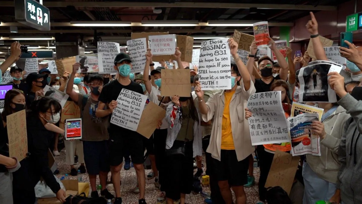 Protesters at a sit-in inside the Prince Edward metro station to demand full unedited CCTV footage of when police stormed into the station and attacked citizens last weekend, in Hong Kong on Sept. 6, 2019. (Shenghua Sung/NTD News)