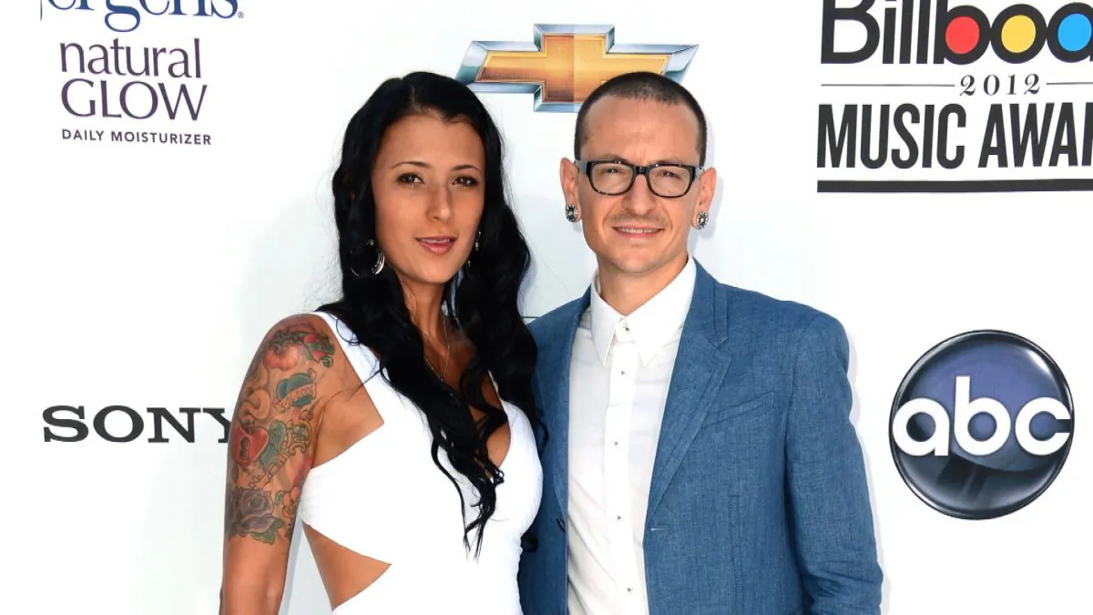 Musician Chester Bennington of Linkin Park (R) and wife Talinda Ann Bentley (L) arrive at the 2012 Billboard Music Awards held at the MGM Grand Garden Arena in Las Vegas, Nevada, on May 20, 2012. (Frazer Harrison/Getty Images for ABC)