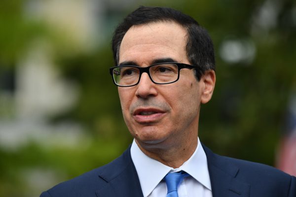 US Treasury Secretary Steven Mnuchin answers questions from journalists outside the White House.