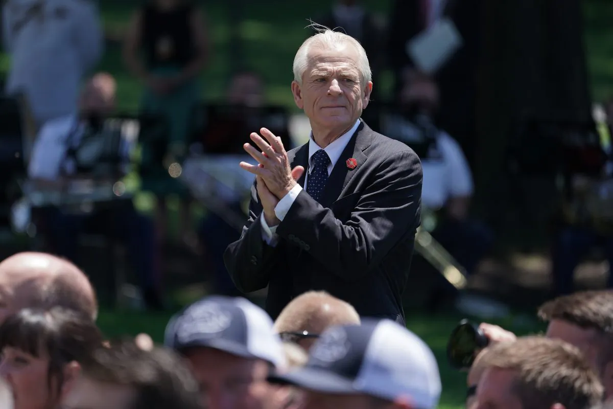 White House Trade and Manufacturing Policy Director Peter Navarro applauds for U.S. President Donald Trump during the 'Made In America' product showcase at the White House in Washington, on July 15, 2019. (Chip Somodevilla/Getty Images)