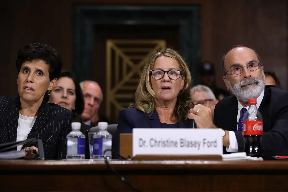 Christine Blasey Ford (C) is flanked by her attorneys Debra Katz (L) and Michael Bromwich as she testifies before the Senate Judiciary Committee in the Dirksen Senate Office Building on Capitol Hill Sept. 27, 2018 in Washington, DC. (Win McNamee/Getty Images)