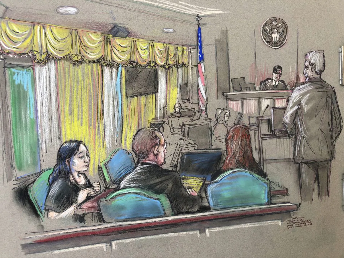 In this April 15, 2019, file court sketch, Yujing Zhang, left, a Chinese woman charged with lying to illegally enter President Donald Trump's Mar-a-Lago club, listens to a hearing before Magistrate Judge William Matthewman in West Palm Beach, Florida. (Daniel Pontet via AP, File)