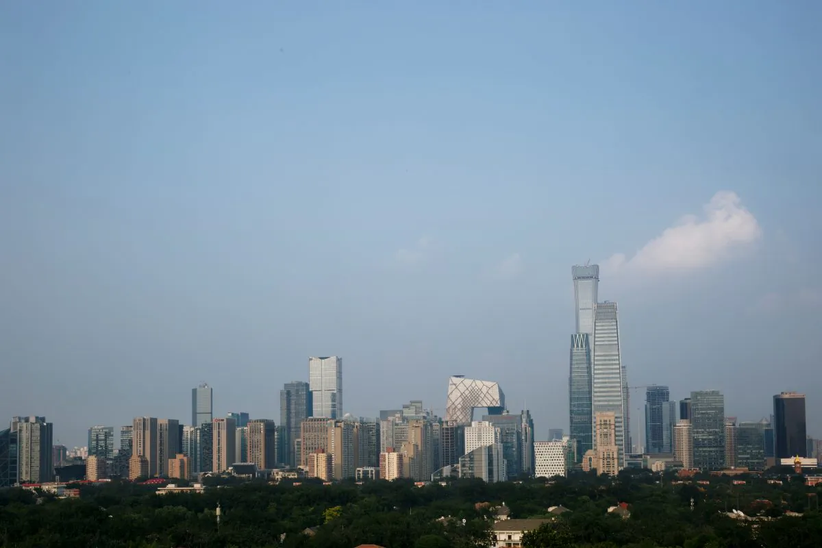 The skyscrapers of the Central Business District rise behind the capital's embassy neighborhood in Beijing, China on July 28, 2018. (Thomas Peter/Reuters)