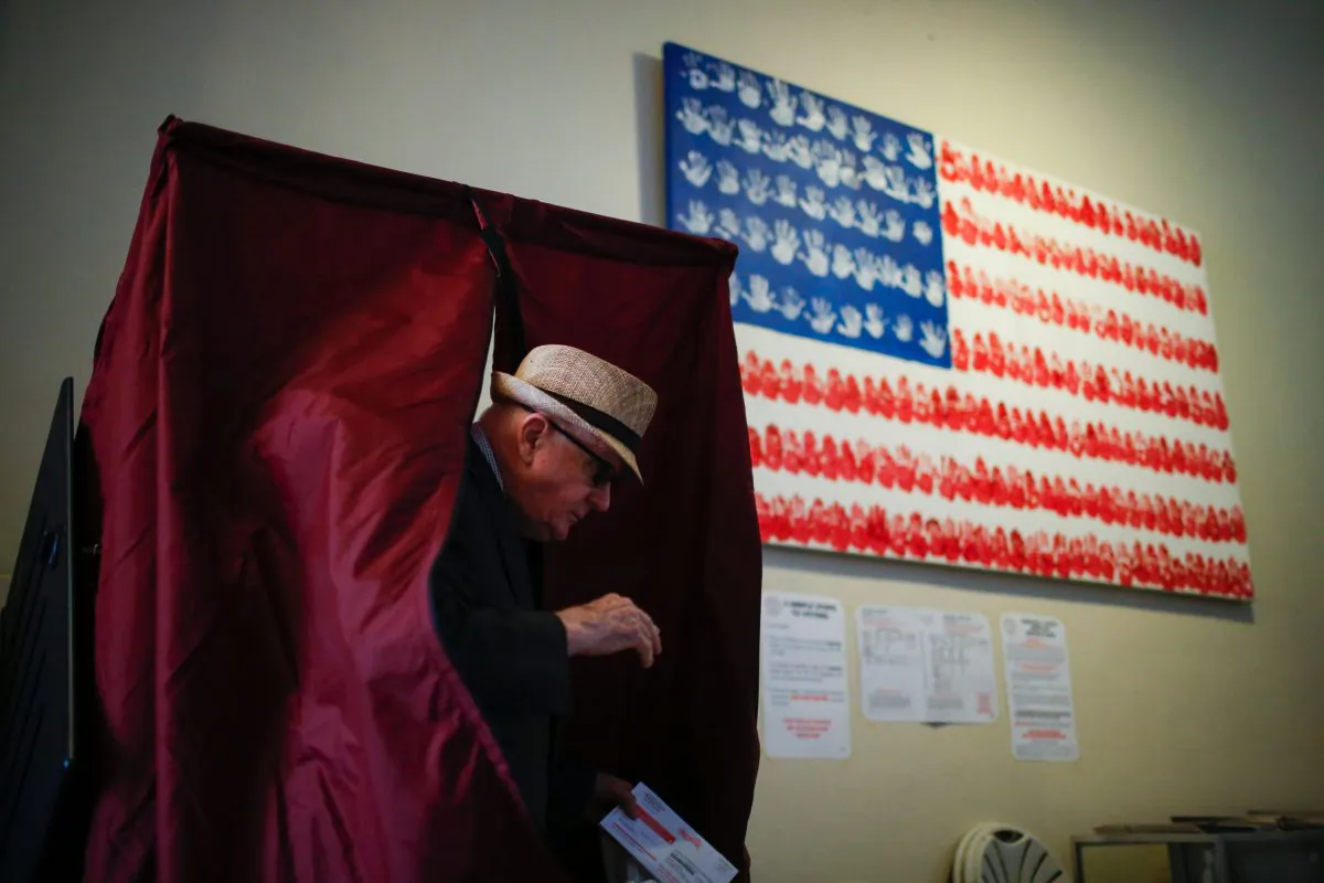A man casts his ballot at polling station during New Jersey's primary elections on June 7, 2016 in Hoboken, New Jersey. / AFP / EDUARDO MUNOZ ALVAREZ/AFP/Getty Images