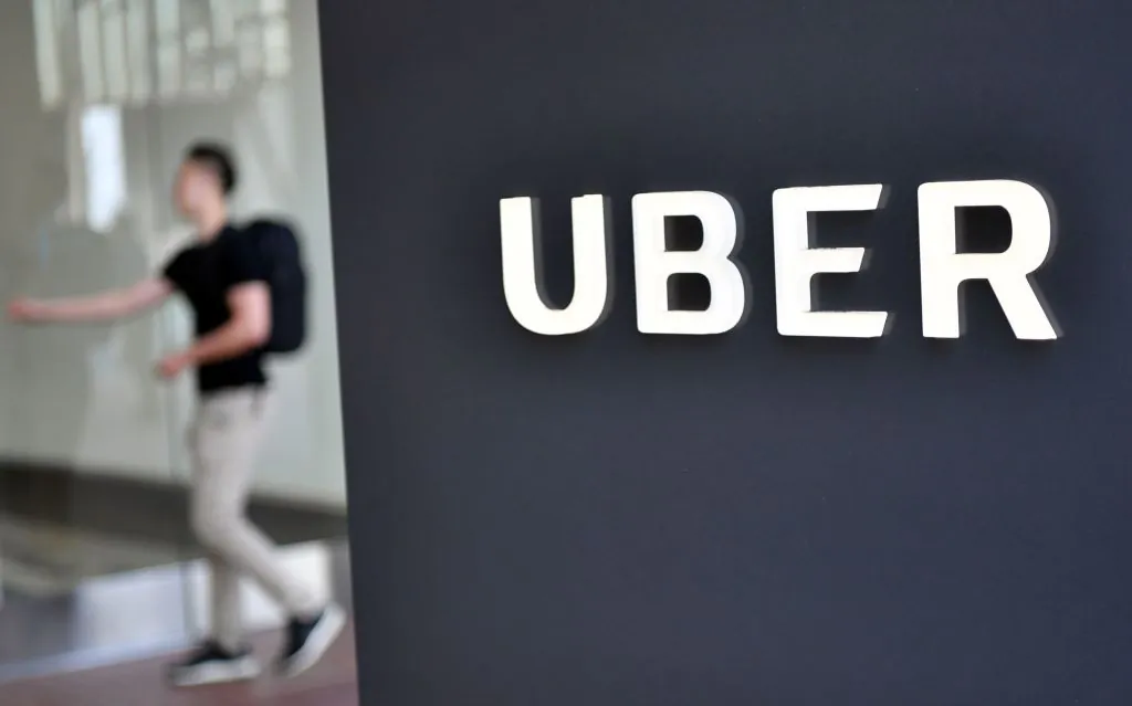 A man walks into the Uber Corporate Headquarters building in San Francisco, California on February 05, 2018. (JOSH EDELSON/AFP/Getty Images)