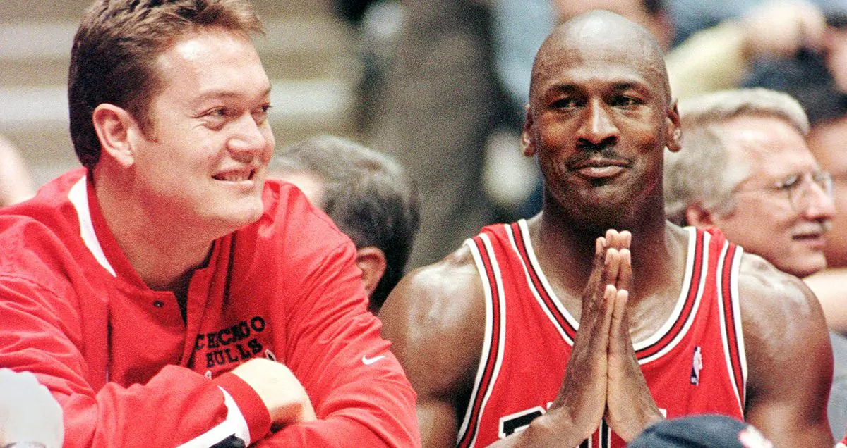 Michael Jordan (R) with Luc Longley when they played for the Chicago Bulls in East Rutherford, N.J., on April 29, 1998. (Stan Honda/AFP/Getty Images)