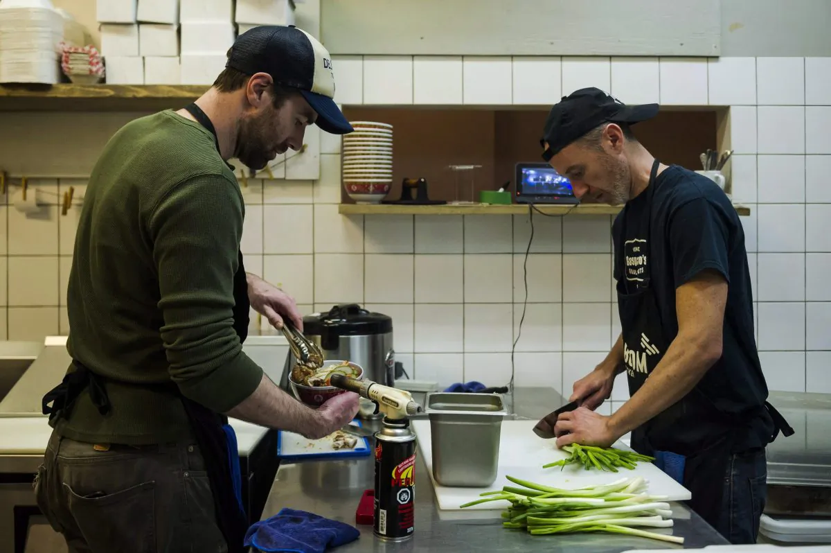 Restaurant workers are typically among the many youth working minimum wage jobs. The 2018 increases in the minimum wage have forced restaurant owners into making difficult decisions to either cut staff, raise prices, or absorb the extra costs. (The Canadian Press/Christopher Katsarov)