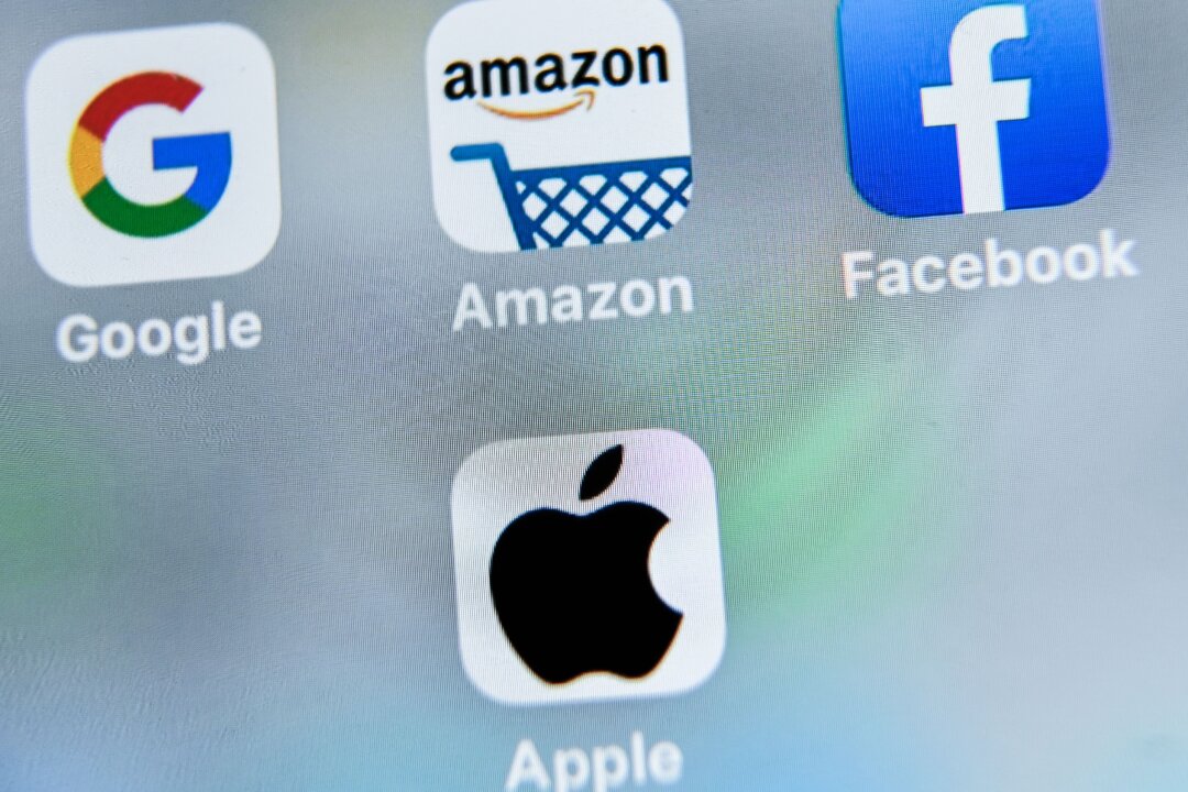 A picture taken on Aug. 28, 2019 shows the apps of Google, Amazon, Facebook and Apple. (DENIS CHARLET/AFP/Getty Images)
