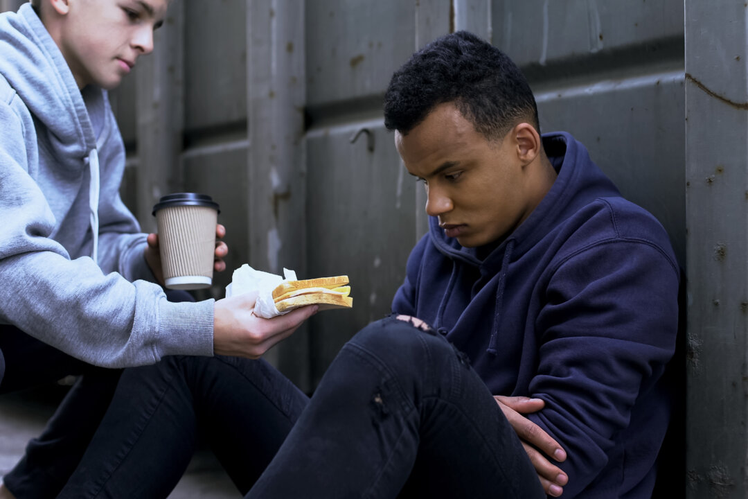 Often the best way to feel better about yourself or your life is to do something kind for someone else.  (Motortion Films/Shutterstock)