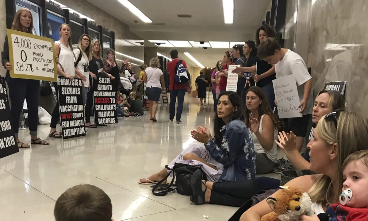 Protesters of recently passed laws regulating medical exemptions of vaccinations inside the California State House in Sacramento, Calif. on Sept. 11, 2019. (Courtesy Jenny Hensley)