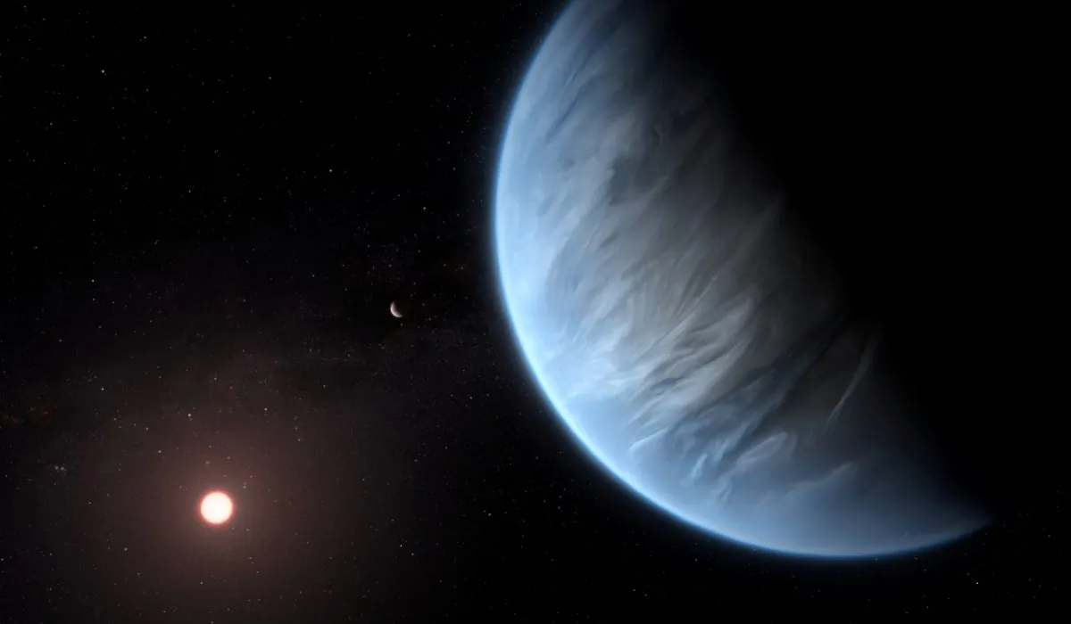 An artist's impression released by NASA shows the planet K2-18b, its host star and an accompanying planet, on Sept. 11, 2019. (ESA/Hubble/M. Kornmesser/NASA Handout via REUTERS)