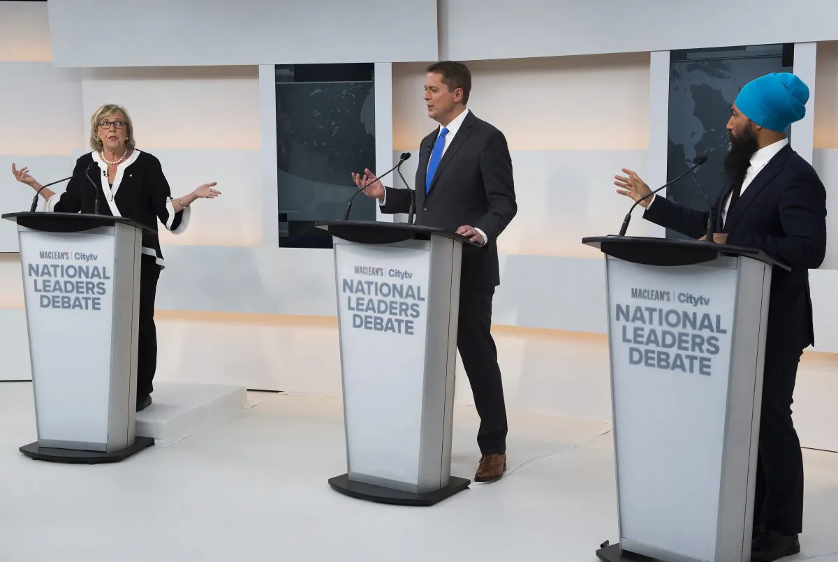 (L-R) Green Party Leader Elizabeth May, Conservative Leader Andrew Scheer, and NDP Leader Jagmeet Singh take part during the Maclean's/Citytv National Leaders Debate in Toronto on Sept. 13, 2019. (THE CANADIAN PRESS/Frank Gunn)