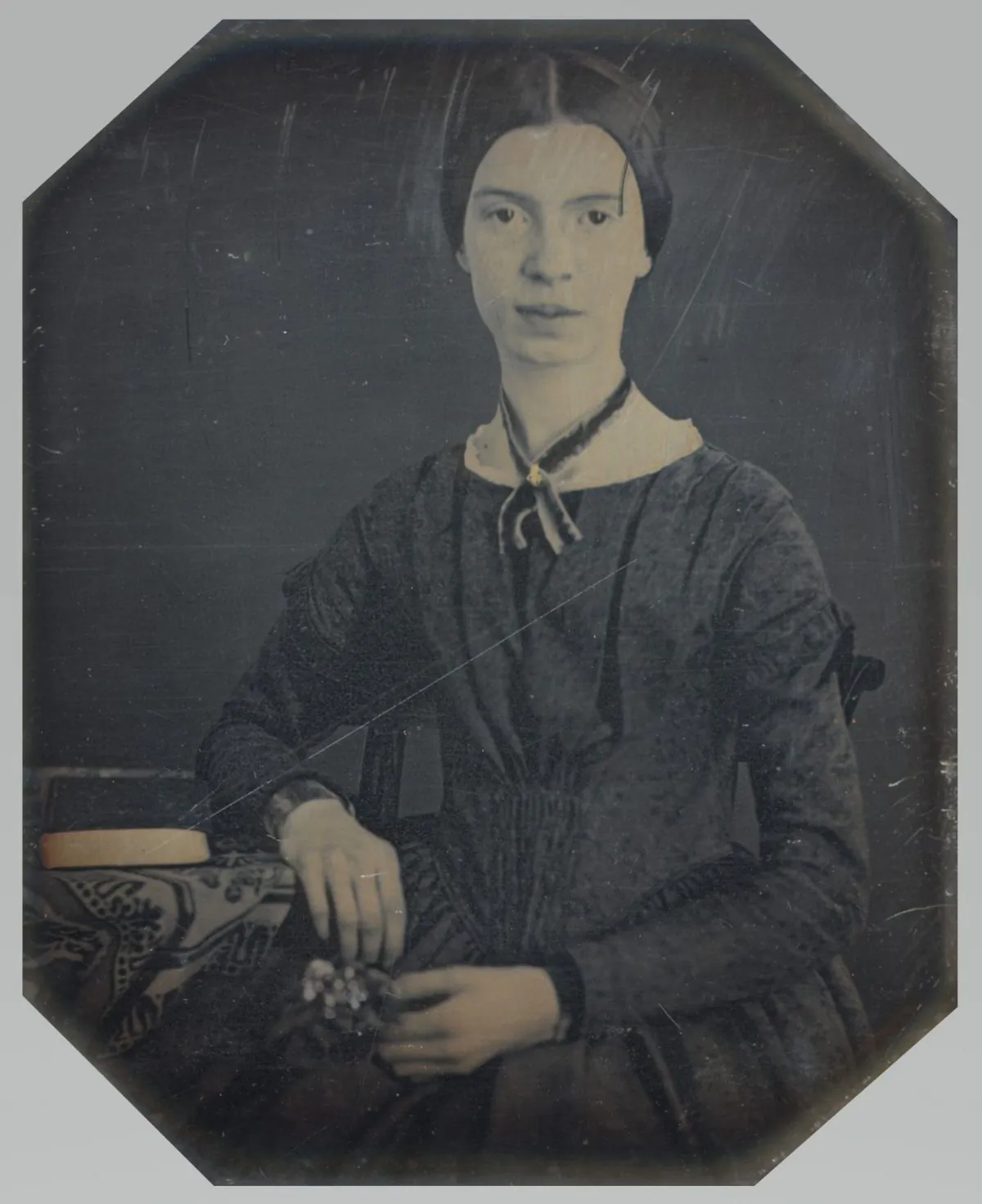 A daguerreotype taken in December 1846 or early 1847; the only authenticated portrait of Emily Dickinson after childhood.  Amherst College Archives & Special Collections. (Public Domain)