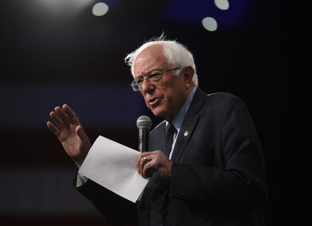 Bernie Sanders speaks on stage
